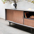 The matt brown-grey colour of the oak structure offers a beautiful contrast to the doors made of