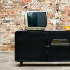 Beautiful 1950s buffet in a rustic interior.