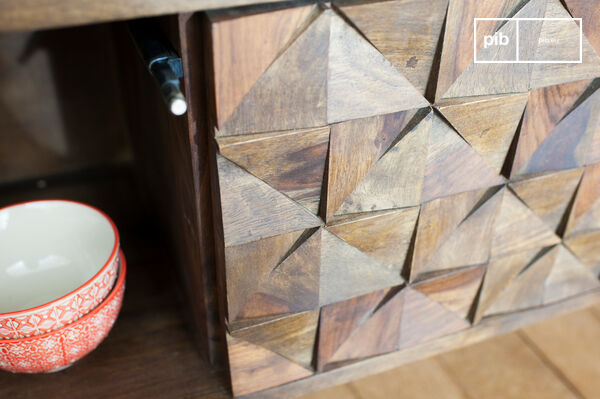 Dozens of wooden triangles were assembled by hand.