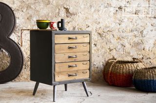 Aged wooden chest of drawers