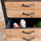 Several industrial-style drawers allow for easy storage.