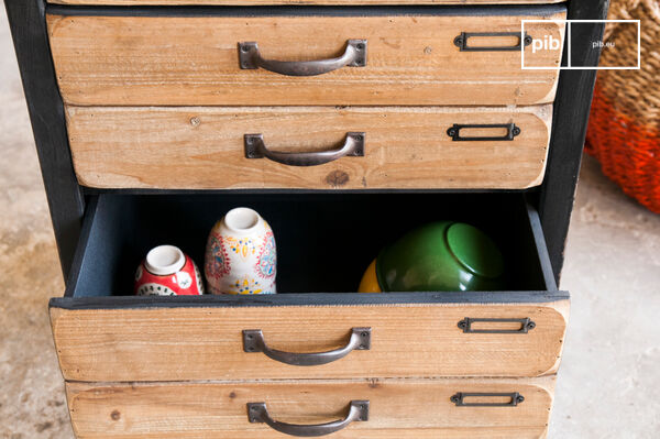 Several industrial-style drawers allow for easy storage.