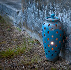 All'interno è presente una campana in vetro per posizionare una candela