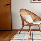 Fauteuil van honing eikenkleurig massief essen en riet Cocon