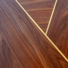 It rests on a cylindrical base made of solid ash