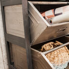 The storage spaces have a beautiful patina finish.