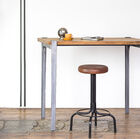 Nice standing food made of teak wood and steel.