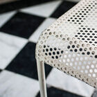 The white finish is slightly patinated.