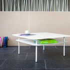 The coffee table features lines from the 1950s.