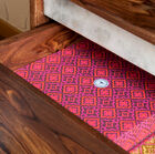 A large drawer allows you to store objects.