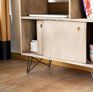 There are two compartments which can be closed by sliding doors to hide the less aesthetic objects