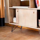 There are two compartments which can be closed by sliding doors to hide the less aesthetic objects