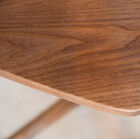 The rounded corners contrast with the straight lines on the design.