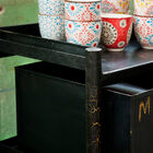 The paint is cracked and reveals a pretty golden colour.